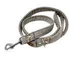 Dog leash with textured pattern on a white background