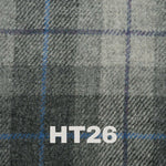 Outdoor scene featuring the 6oz Stainless Steel Hip Flask with Harris Tweed Wrap, perfect for adventures.