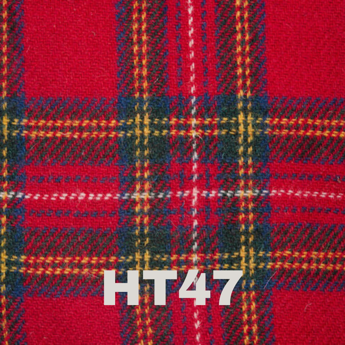 6oz Stainless Steel Hip Flask with Harris Tweed Wrap next to a glass, ideal for toasting special occasions.