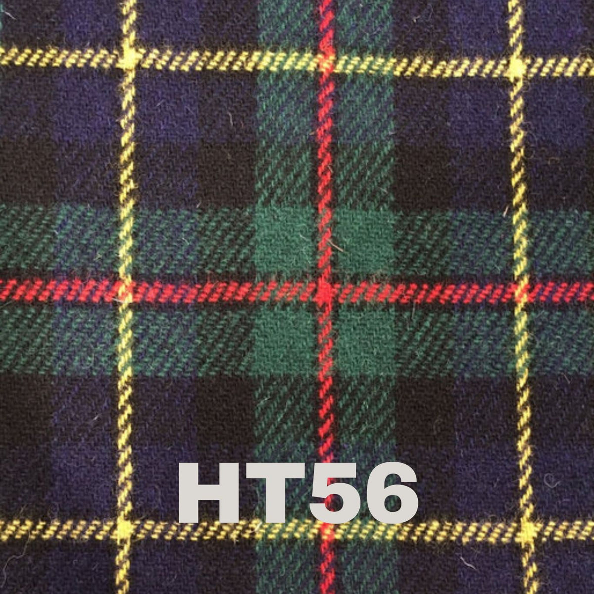 Casual lifestyle image of the 6oz Stainless Steel Hip Flask with Harris Tweed Wrap, set against a cozy background.