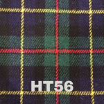 Casual lifestyle image of the 6oz Stainless Steel Hip Flask with Harris Tweed Wrap, set against a cozy background.