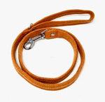 orange tweed dog leash with a metal clip on a white background