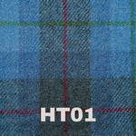 blue tartan design harris tweed with a red and green line running through it