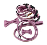 Purple Tweed Dog Collars with matching bow ties and lead on a white background